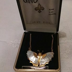 Beautiful mother of pearl butterfly necklace.